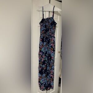 Maurice’s floral romper. Adjustable straps. Worn once